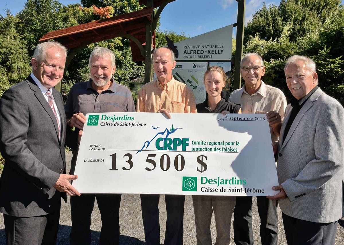 Patrice Mainville, directeur général de la Caisse Desjardins de Saint-Jérôme, Claude Bourque, Gilbert Tousignant, Éricka Thié