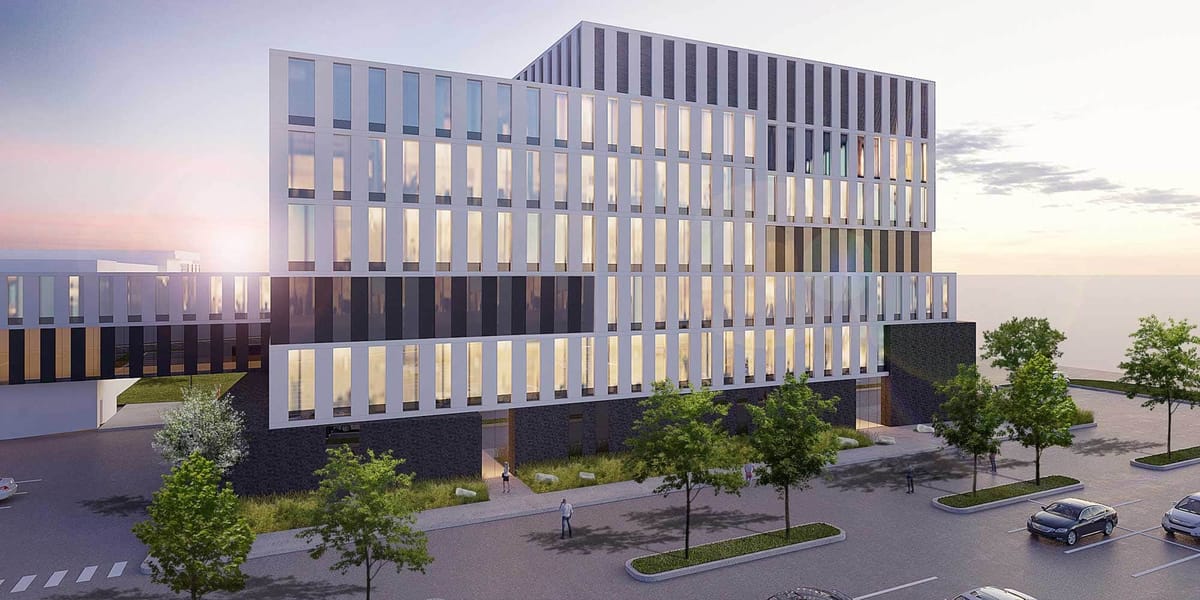 Le nouvel immeuble, d’allure résolument moderne, sera relié au palais de justice, qu’on distingue ici à gauche, et occupera l